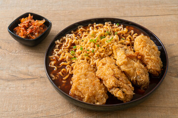 Korean instant noodles with fried chicken or Fried chicken ramyeon