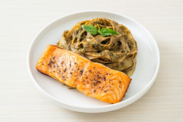 pesto fettuccine spaghetti pasta with grilled salmon fillet