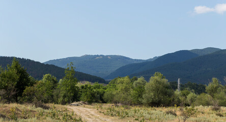 Naklejka premium Panoramic terrain of southern Europe. Landscape of Bulgaria-mountains, fields, flora.