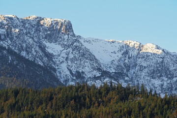 Snowy Tantalus mountain range seen from the Eagle Run dike in Brackendale, Squamish, British Columbia, Canada