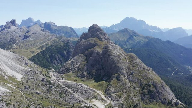 Mountain road surrounded by high peaks, Valparola pass in Alta Badia, Dolomites