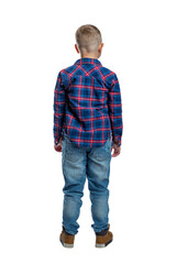 A blond boy in jeans and a plaid shirt stands with his back. Full height. Isolated on white background. Vertical.