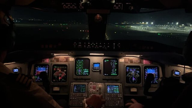 Jet cockpit view during a real night approach to Valencia’s airport, Spain,