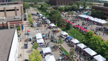 Aerial, local street fair at an American suburb during the weekend