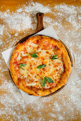 homemade pizza on the wooden board