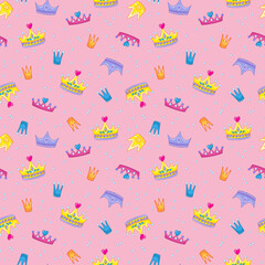 Seamless pattern with cute multicolored king or princess crowns on an pink background. Tiara and pearls in a funny children's style. Vector illustration for print clothes, postcards, textiles. © GreenPencil