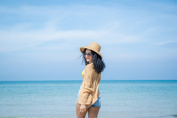 Pretty slim girls at tropical sea beach,Enjoy and fun outdoor activity lifestyle on holiday travel vacation at the sea.