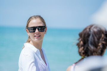 Happy female friends enjoy and fun outdoor activity lifestyle on holiday travel vacation at the sea,Friendship,Sea,Holidays,Gesture and people concept.