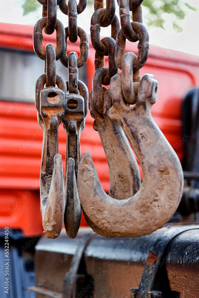 Poster crane hook for lifting loads. lifting device for stacking cargo. lifting and moving heavy loads on a