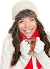 winter woman drinking tea wearing warm winter clothing, sweater, gloves and scarf. Beautiful mixed race Asian Caucasian girl model isolated cutout PNG on transparent background.