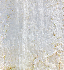 Emerald water in white limestone rock.