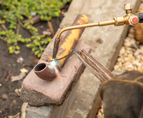 Gas welding of metal at the construction site.