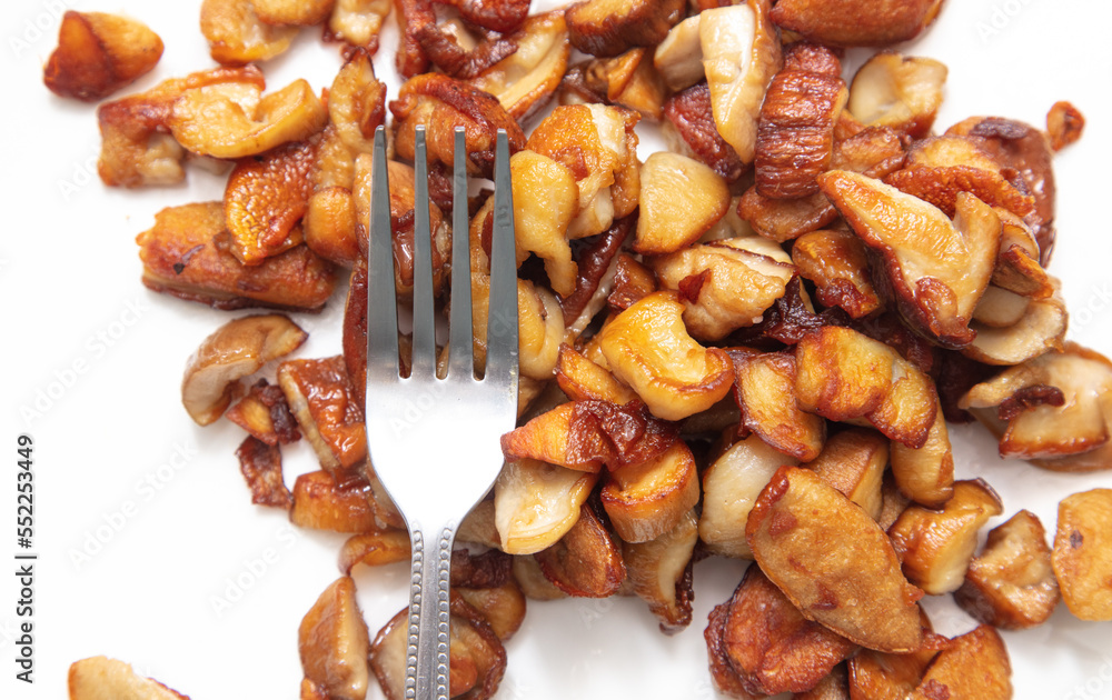 Poster Fried mushrooms isolated on white background.