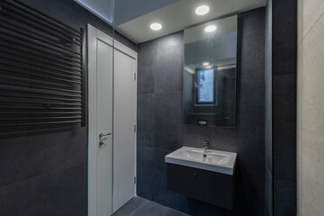 Obraz na płótnie Canvas Bathroom interior with glass shower cabin