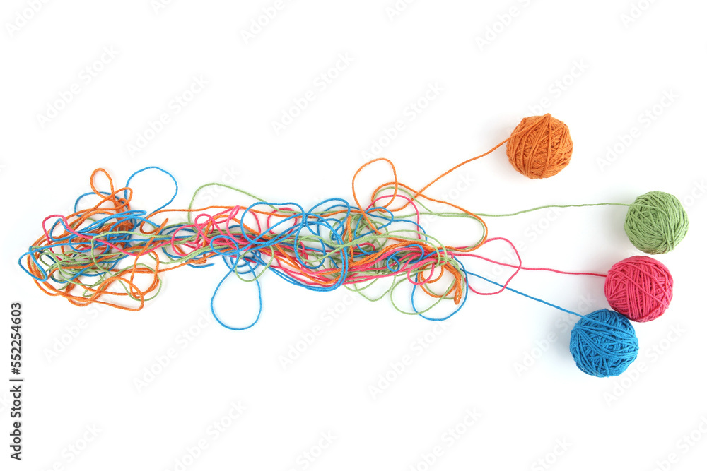 Wall mural tangled colorful cotton threads and balls isolated on white background. abstract thread lines chaos 