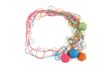Circe of tangled colorful cotton threads isolated on white background. Abstract thread lines chaos pattern and balls.
