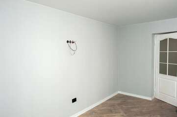room after renovation, laminate and clean walls, restrained color of modern style and design