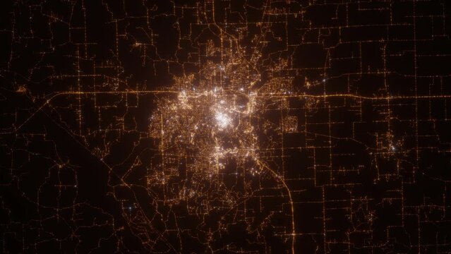 Columbia (Missouri, USA) aerial view at night. Top view on modern city with glow effect. Camera is zooming out, rotating counterclockwise