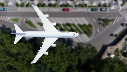 plane flies above the landscape. Side view of aircraft. Travel and transportation concept.