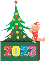 A little boy sits on a cube in a santa hat and smiles