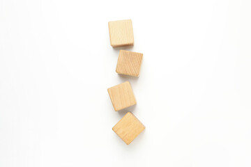Blank wooden cubes for different concepts, top view