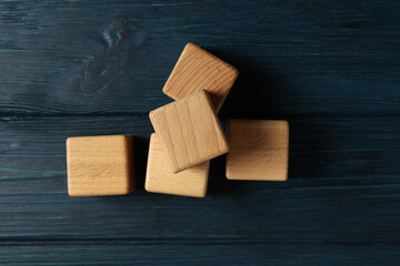 Blank wooden cubes for different concepts, top view