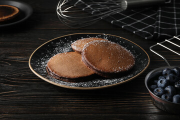 Concept of sweet food, tasty chocolate pancakes