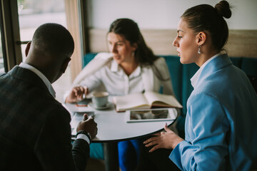 Three students at a bar