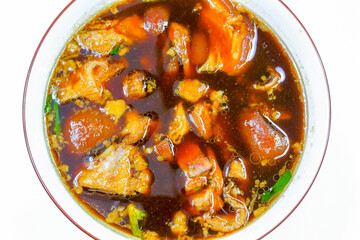 Thai food stewed pork leg with five spices in brown sauce