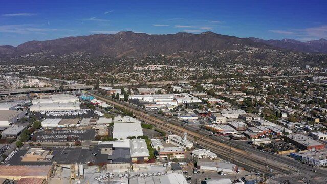 Aerial panning shot from the 134 Freeway to downtown Glendale, California. 4K