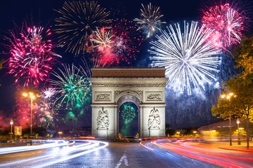Afwasbaar Fotobehang Parijs New Year fireworks display over the Arc de Triomphe in Paris. France