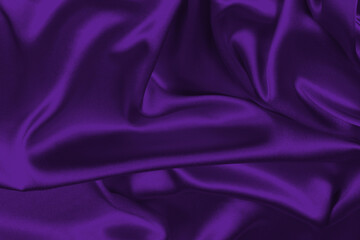 Rich and luxury red silk fabric texture background.