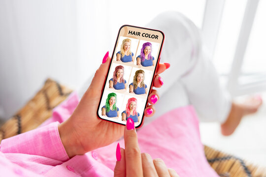 Woman choosing new hair color on mobile beauty app