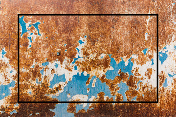 rusted galvanized steel sheet with a black frame for inserting text