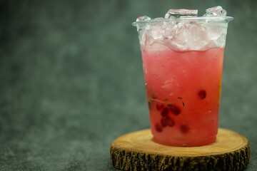 Glass with a chilled pink drink. Close up