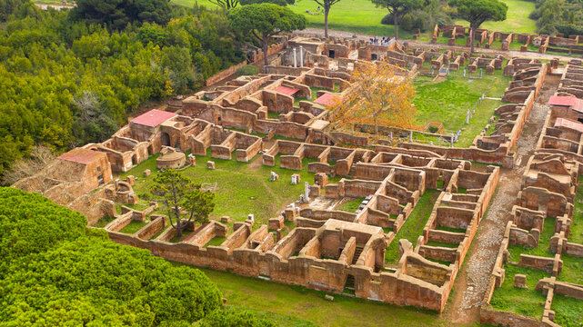 Aerial view of Neptune Roman empire thermal bath and the Barracks of the Fire Brigade of Ostia Antica. The archaeological site of Gymn of Terme di Nettuno and Caserma dei vigili are located near Rome.