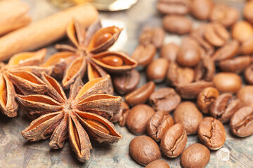 chocolate candies with anise,cinnamon sticks,coffee beans.