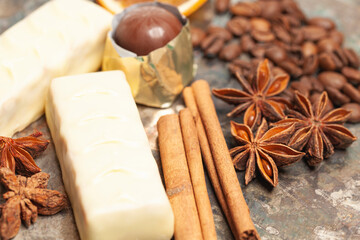Fototapeta premium White chocolate candies with anise,cinnamon sticks,coffee beans.