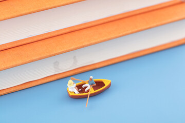 Rowing along the side of mini creative books