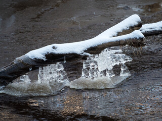 icicles over river water