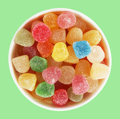 Jelly sweets colorful candies in round cardboard box. View from above. Sweet confectionery candy...