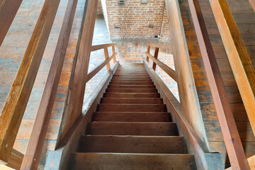 Beautiful wooden staircase in an old building or castle.