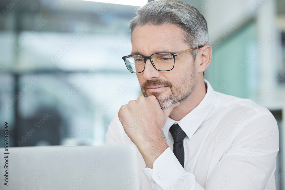 Canvas Prints Thinking, laptop and businessman working on a project and doing research on the internet in office. Technology, idea and professional employee reading corporate company report on his computer at work