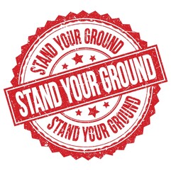 STAND YOUR GROUND text on red round stamp sign