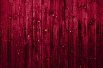 Natural Dark Wooden Background. Wooden rustic background. Copy space for your text or image. Dark brown wood boards. Blank for design and require a wood grain.Color Of The Year 2023 - Viva Magenta