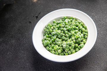 green pea frozen vegetable fresh snack healthy meal food on the table copy space food background rustic top view 