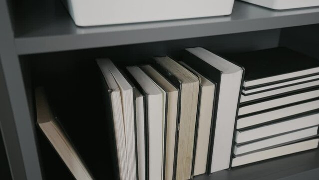 books on a book shelf in a modern home