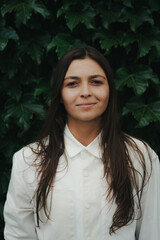 Girl Reading and Walking on Grass, Phone
