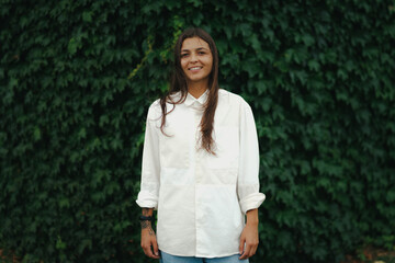 Girl Reading and Walking on Grass, Phone
