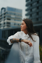 Girl Reading and Walking on Grass, Phone
